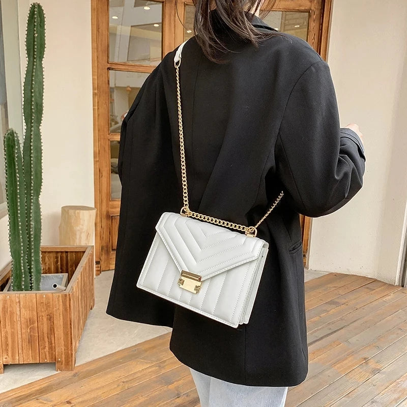 Bolsa Tiracolo Romana